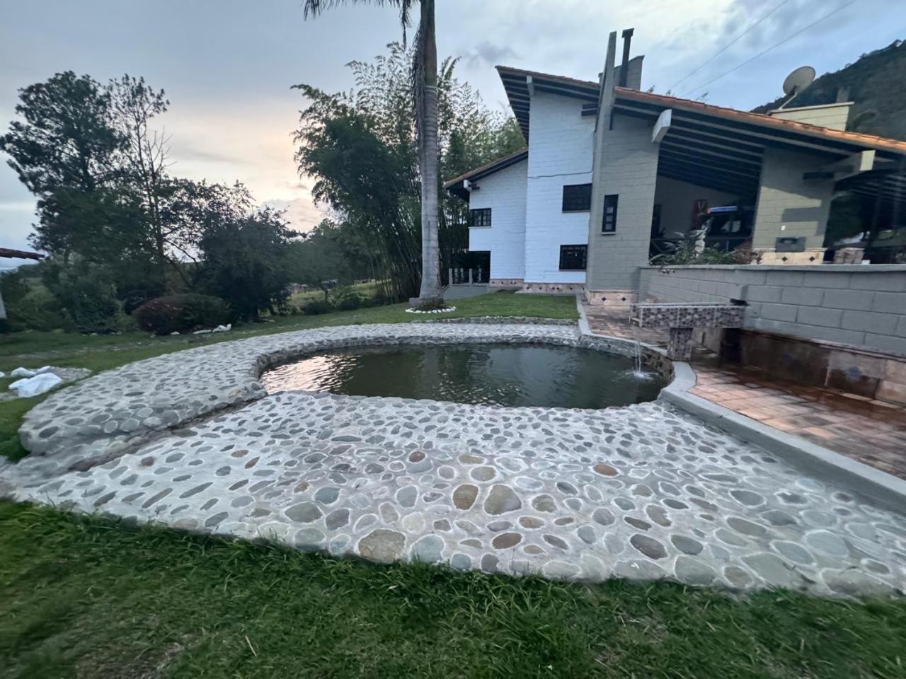 Hotel Maca Lago Calima Buitenkant foto